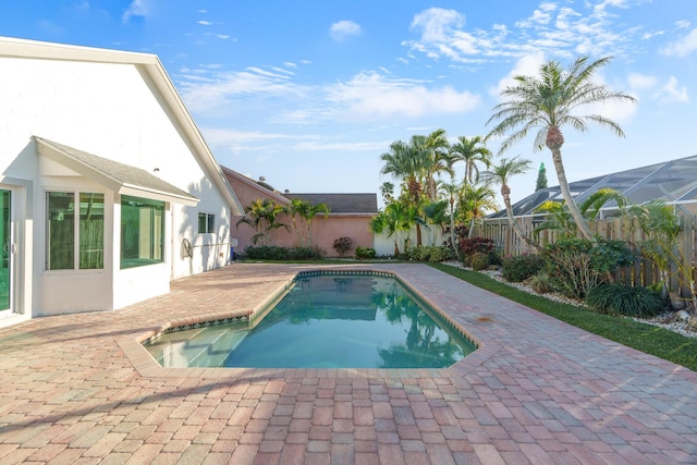 view of pool with a fenced in pool, a patio area, and a fenced backyard