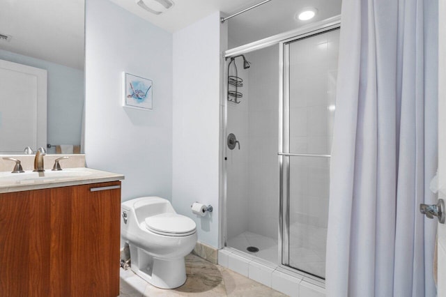 full bathroom featuring toilet, a stall shower, visible vents, and vanity