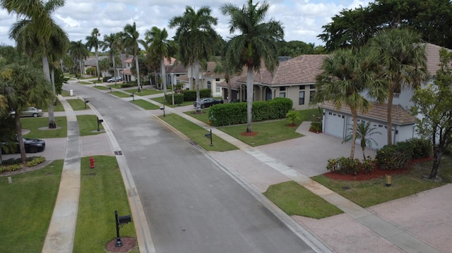 view of road with a residential view and sidewalks