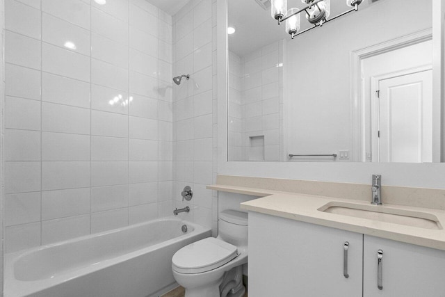 bathroom featuring shower / tub combination, vanity, and toilet