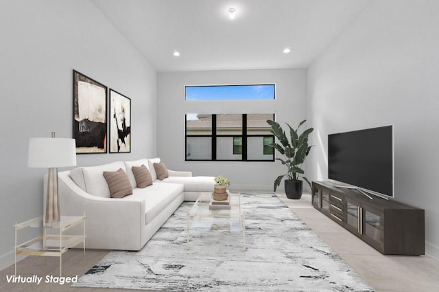 living area featuring recessed lighting