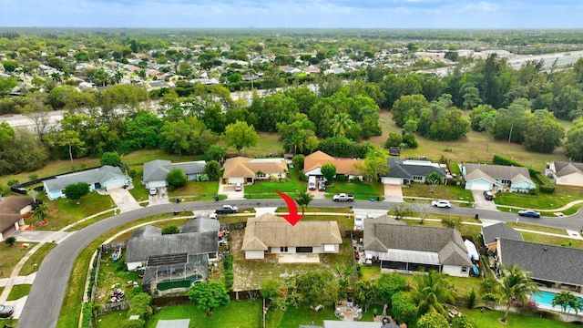 birds eye view of property with a residential view