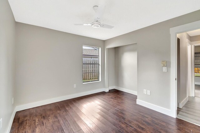 spare room featuring dark wood-style floors, recessed lighting, visible vents, and baseboards