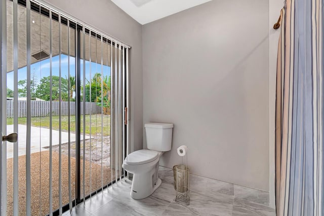 bathroom featuring toilet