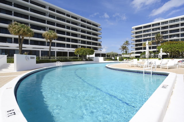 community pool featuring a patio