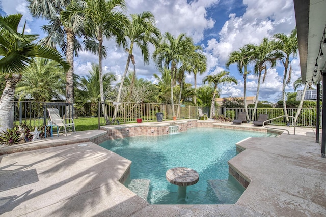 view of pool with a patio area, fence, and a fenced in pool