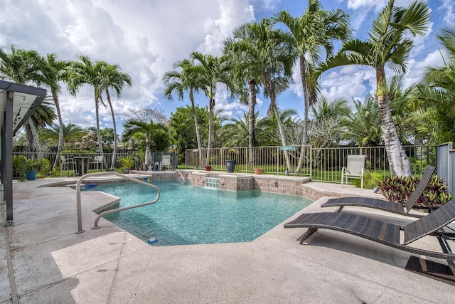 view of pool featuring fence, a fenced in pool, and a patio