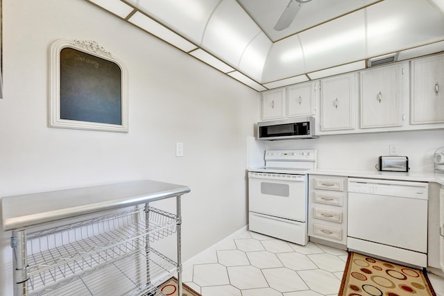 kitchen featuring white appliances, visible vents, ceiling fan, light countertops, and white cabinetry