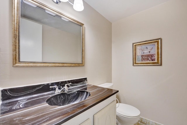 half bath with toilet and vanity