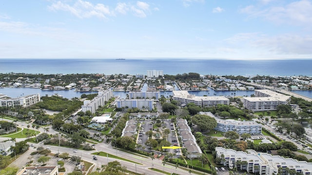 drone / aerial view with a water view and a view of city