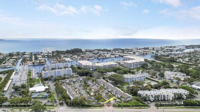 aerial view with a water view and a view of city