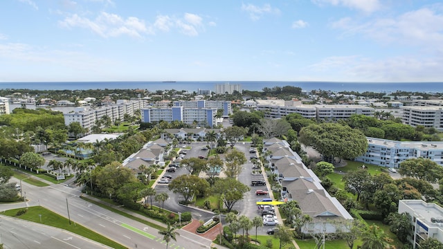 bird's eye view with a water view and a city view