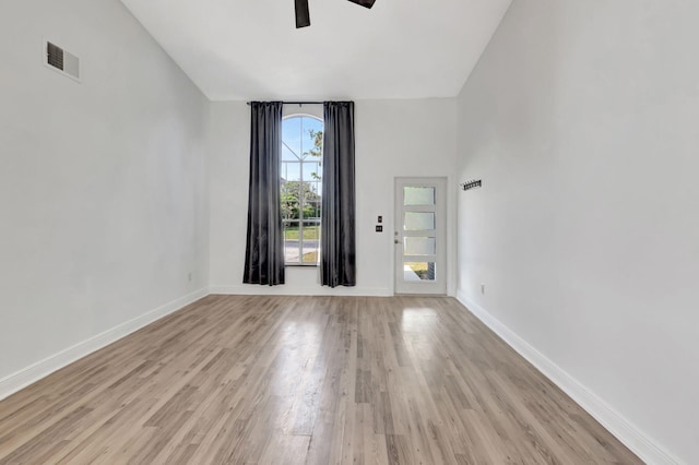5598 Pebble Brook Ln, Boynton Beach, FL 33472 - unfurnished room featuring visible vents, ceiling fan, light wood-style flooring, and baseboards