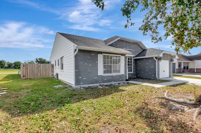 5598 Pebble Brook Ln, Boynton Beach, FL 33472 - ranch-style house featuring an attached garage, brick siding, fence, roof with shingles, and a front yard
