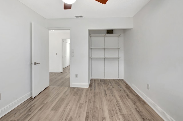 5598 Pebble Brook Ln, Boynton Beach, FL 33472 - unfurnished bedroom featuring light wood-style flooring, visible vents, and baseboards