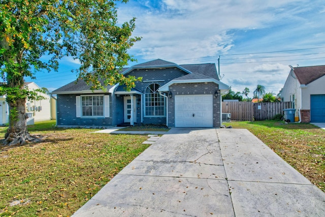 5598 Pebble Brook Ln, Boynton Beach, FL 33472 - ranch-style house with brick siding, fence, driveway, and an attached garage