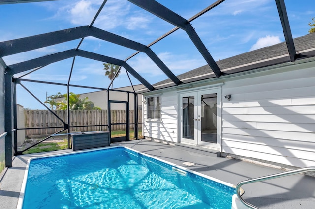5598 Pebble Brook Ln, Boynton Beach, FL 33472 - view of pool featuring a fenced in pool, french doors, a patio, fence, and a lanai