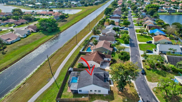 5598 Pebble Brook Ln, Boynton Beach, FL 33472 - aerial view featuring a water view and a residential view