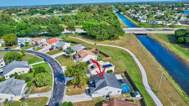 5598 Pebble Brook Ln, Boynton Beach, FL 33472 - aerial view featuring a water view and a residential view