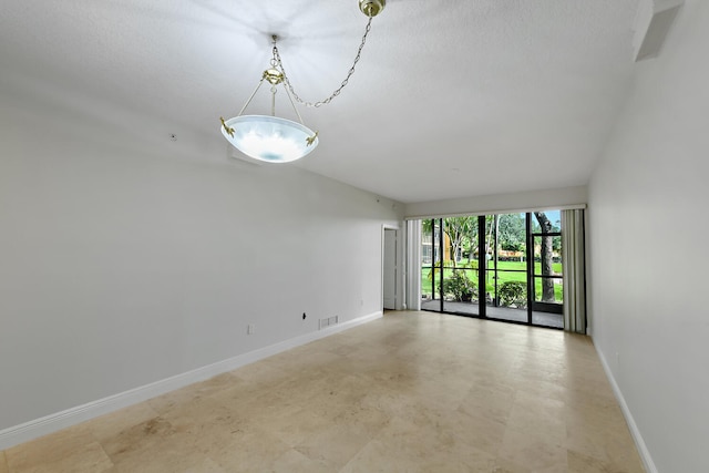 6705 Coral Lake Dr Unit 6705, Margate, FL 33063 - empty room with baseboards