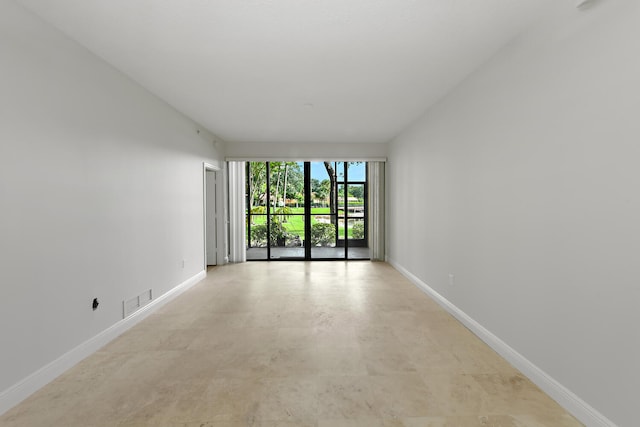 6705 Coral Lake Dr Unit 6705, Margate, FL 33063 - empty room with baseboards
