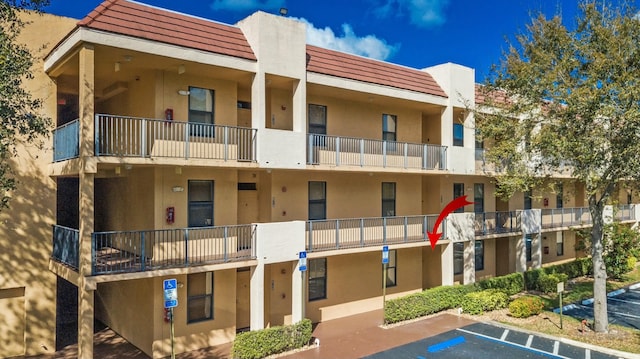 6705 Coral Lake Dr Unit 6705, Margate, FL 33063 - view of apartment building / complex with uncovered parking