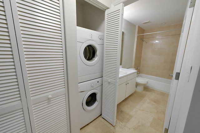 6705 Coral Lake Dr Unit 6705, Margate, FL 33063 - laundry room featuring estacked washer and dryer