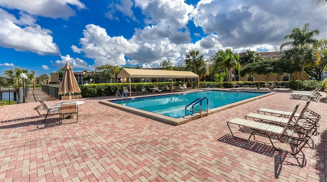 6705 Coral Lake Dr Unit 6705, Margate, FL 33063 - community pool featuring a patio area