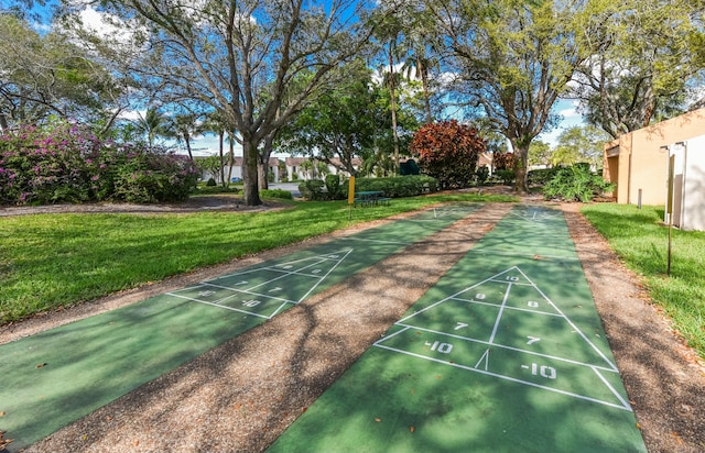 6705 Coral Lake Dr Unit 6705, Margate, FL 33063 - view of home's community featuring a yard and shuffleboard