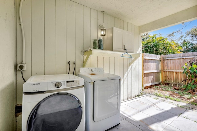 laundry area featuring independent washer and dryer