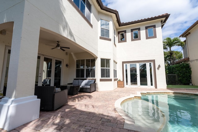 back of house featuring a ceiling fan, a patio area, french doors, and outdoor lounge area