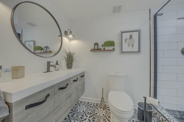 full bath with toilet, tile patterned floors, visible vents, and vanity