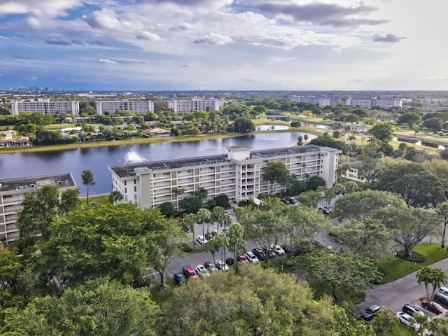 aerial view featuring a water view and a city view