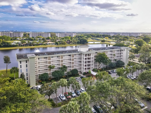 view of property with a view of city and a water view