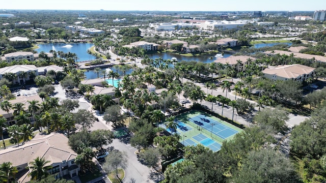 birds eye view of property with a water view and a residential view