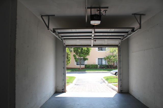 garage featuring a garage door opener