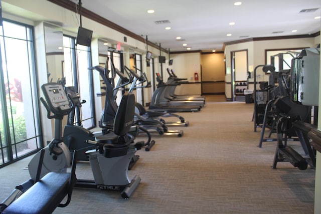 workout area with recessed lighting, visible vents, and crown molding