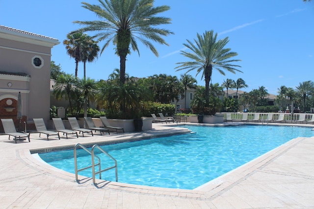 pool with a patio