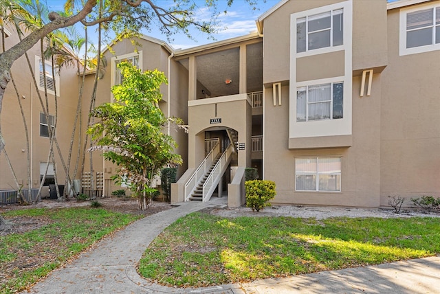 view of property with stairway