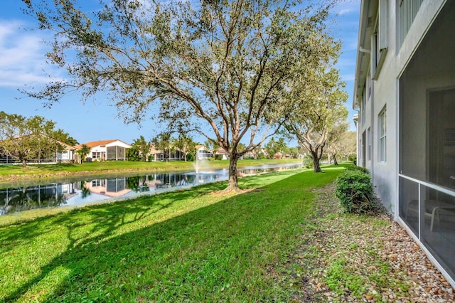 view of yard with a water view