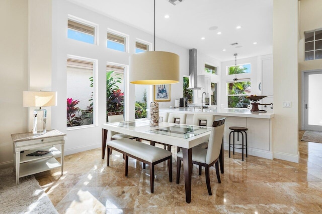 dining space with marble finish floor, recessed lighting, visible vents, and baseboards