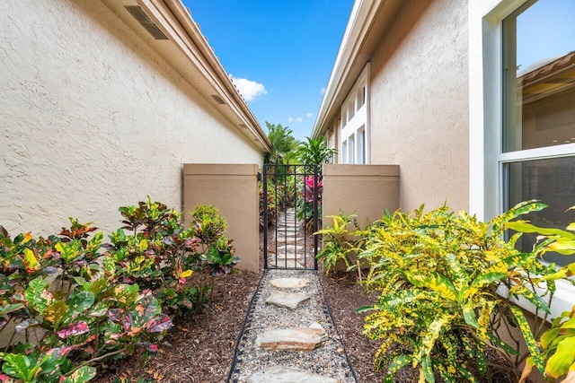 view of yard with a gate