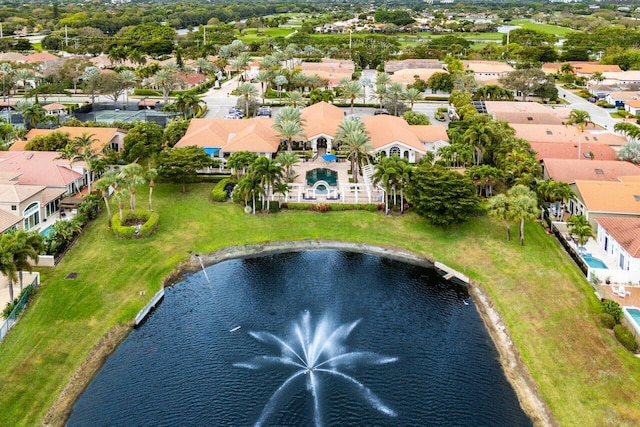 bird's eye view featuring a water view and a residential view