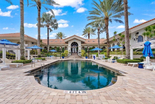 community pool with a patio