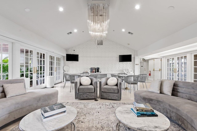 living room featuring high vaulted ceiling, recessed lighting, visible vents, and french doors