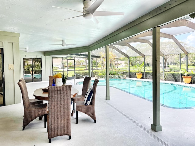3345 Pine Hill Trl, Palm Beach Gardens, FL 33418 - swimming pool with a ceiling fan, a patio, and a lanai
