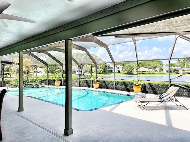 3345 Pine Hill Trl, Palm Beach Gardens, FL 33418 - outdoor pool with a patio area, glass enclosure, a water view, and a residential view