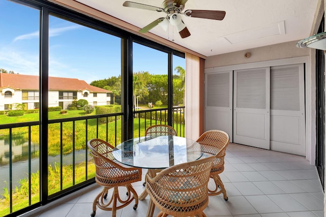 sunroom with a water view