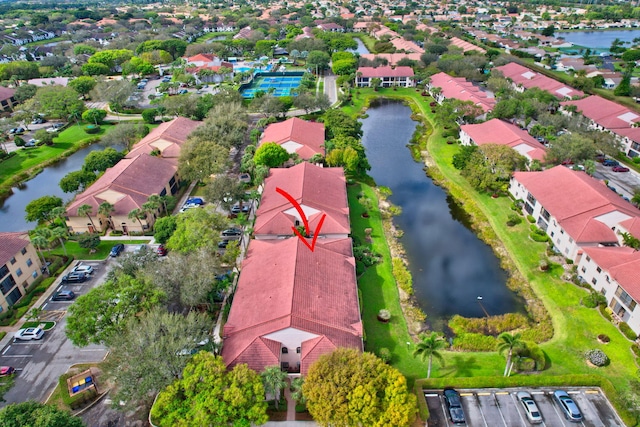 aerial view with a water view and a residential view