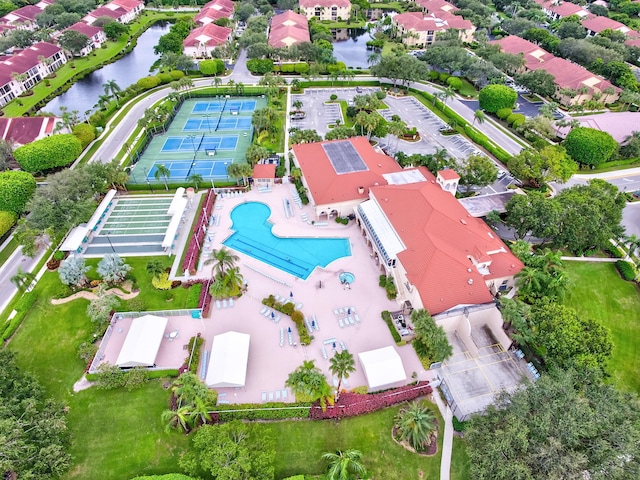 birds eye view of property featuring a residential view and a water view